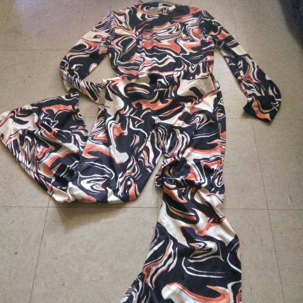 Swirl Pattern Jumpsuit in Black, White, and Orange